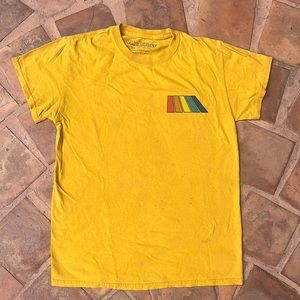 Free and Easy shirt size small. Yellow